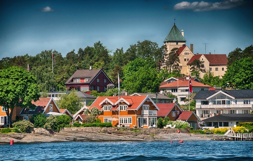 Domečky na pobřeží v Oslu.